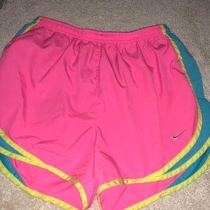 Neon Nike running shorts